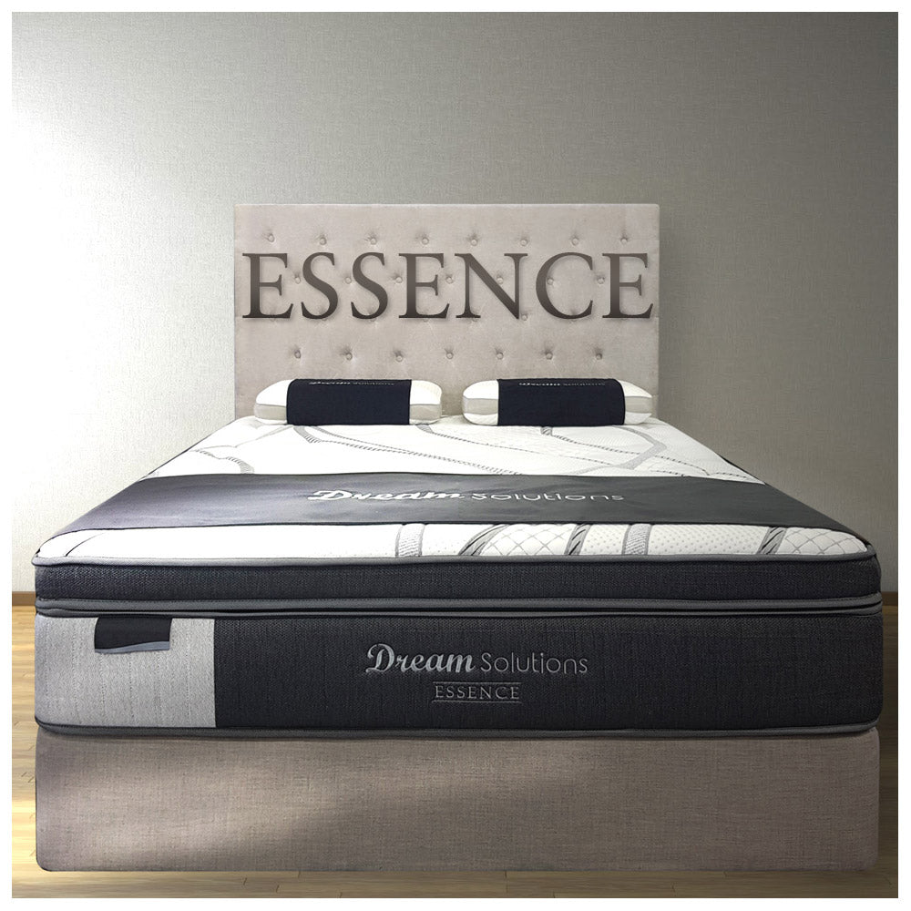dream solutions essence mattress on bed base with head board and pillows